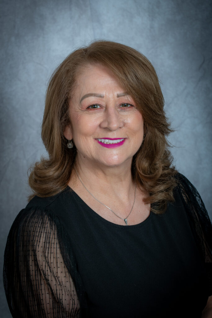 woman smiling with pink lip stick